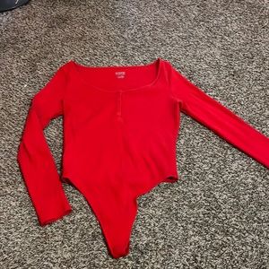 Low neck half button body suit